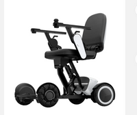 Adults using new intelligent Electric Wheelchair and high configuration electric mobility vehicles